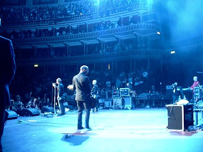 The band seen from the back of the stage