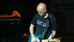 Stu sound checking with his guitar