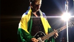 Martin draped in the flag of Brazil