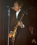 Suited, Singing and Playing