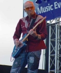 Stu with guitar and shades