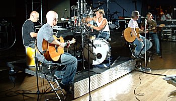 The band practise their acoustic set