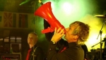 Martin paints the megaphone red