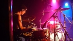 Stew at the back of the stage with his drums