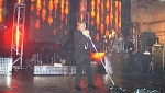 Martin singing whilst fire rains down