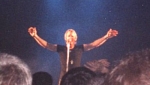 Martin with arms outstretched